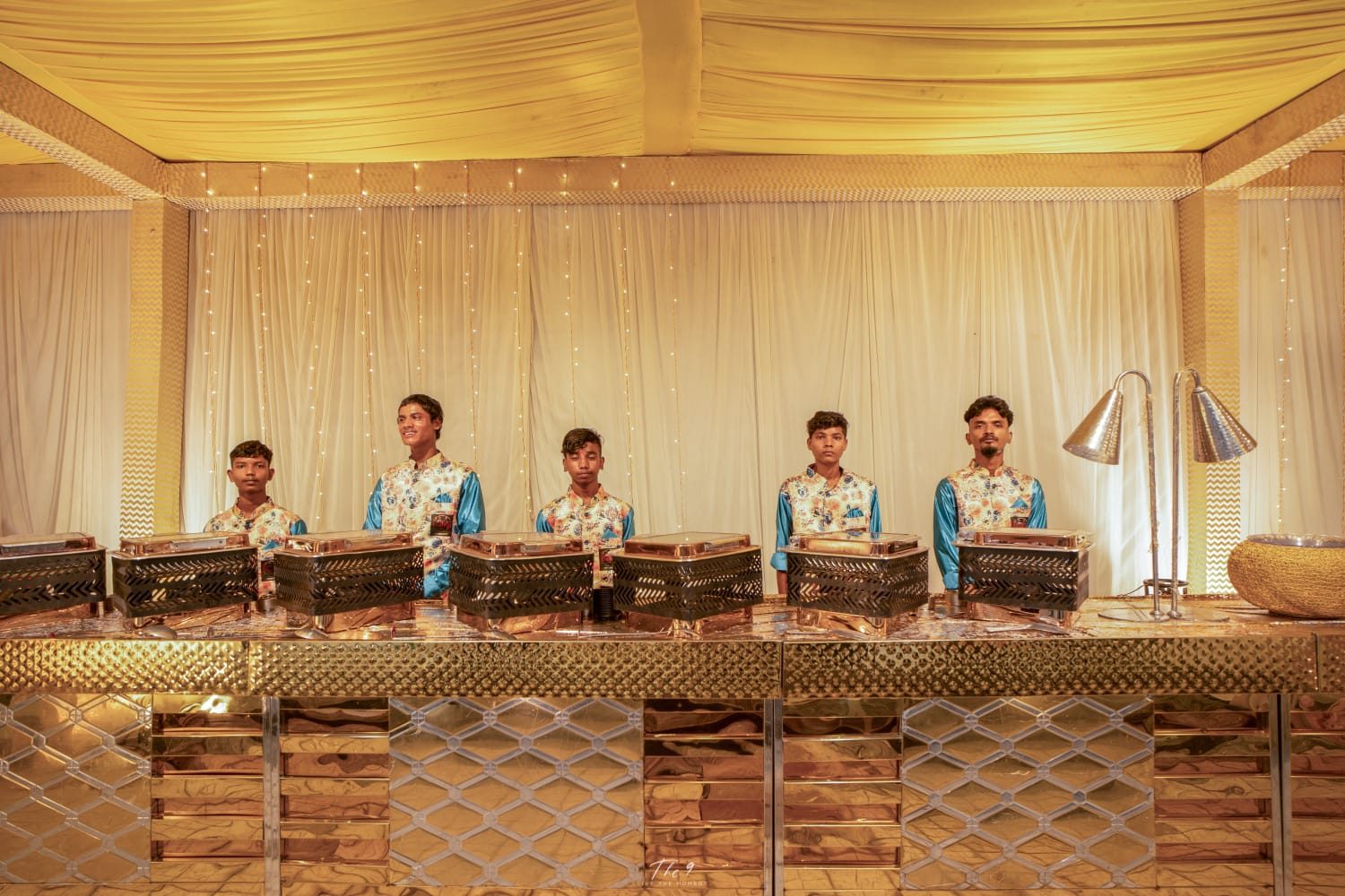 Live buffet counter with chefs serving guests